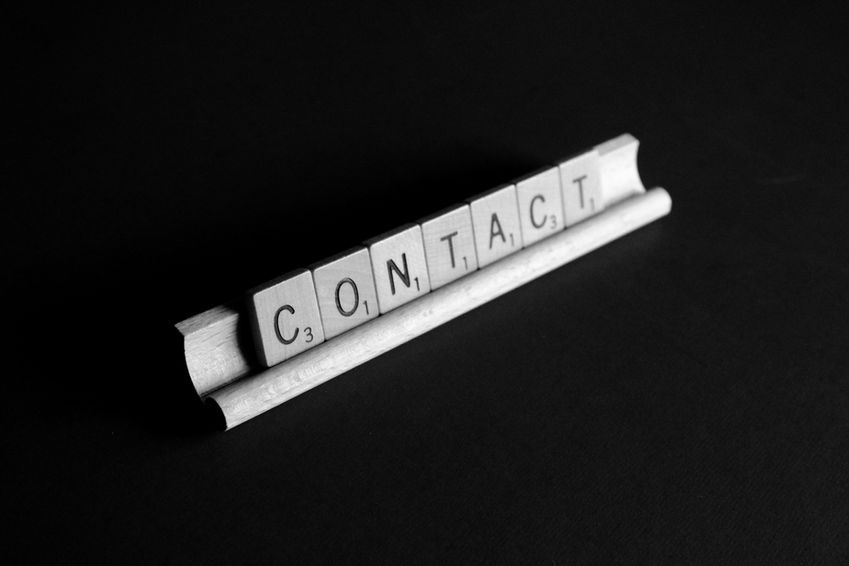 contact spelled in scrabble letters